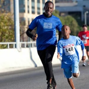 Former Abilene Christian University Track standout Gilbert Tuhabonye, co-founder of the Gazelle Foundationis one of 43 immigrants whose portraits and inspirational stories re featured in george W. Bush's new book.